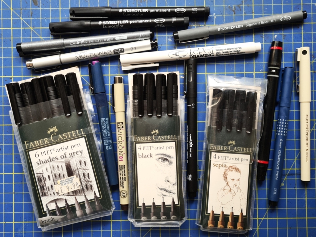 A selection of fine point ink pens. Some use archival ink, most do not. All are permanent however